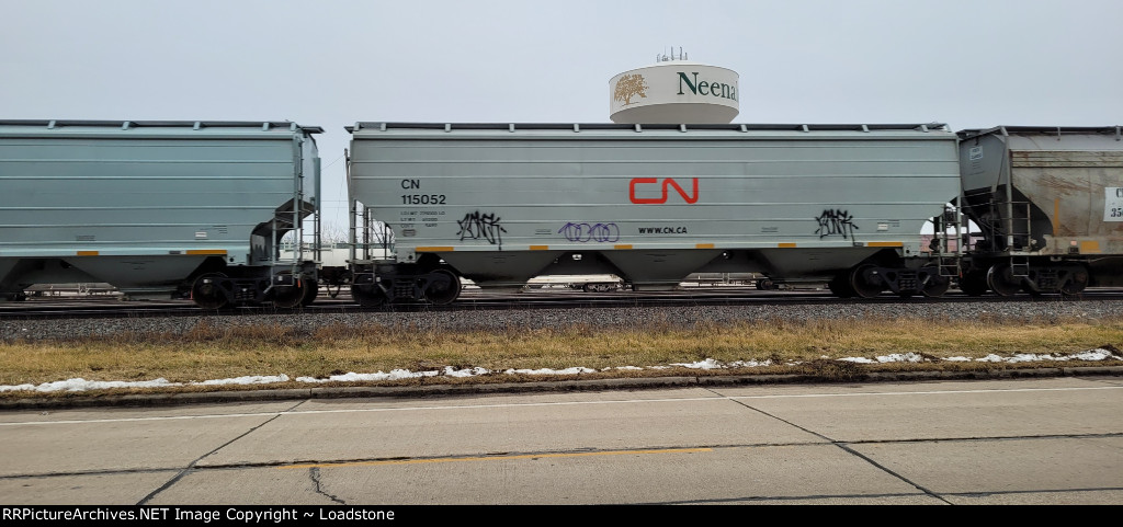 CN 115052